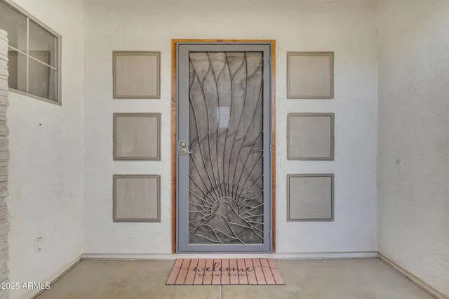 a view of a livingroom with furniture and a ceiling fan