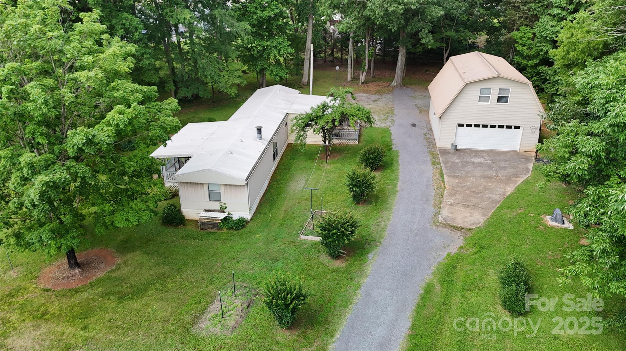a view of a garden with a house