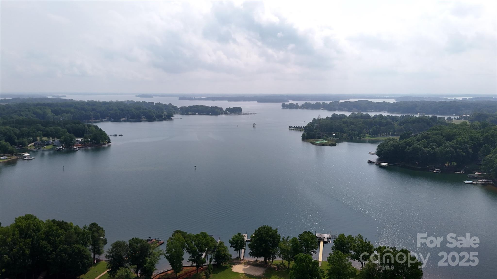 8112 Blackwood Road Denver, NC 28037 - Photo 11 of 19 a view of a lake with houses in back