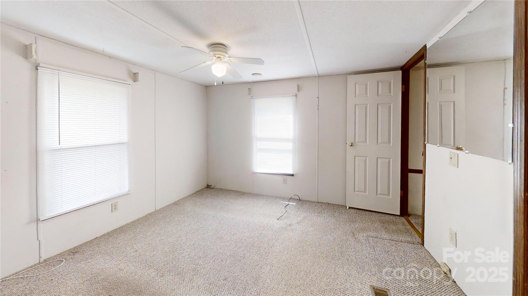 8112 Blackwood Road Denver, NC 28037 - Photo 15 of 19 a view of an empty room with a window
