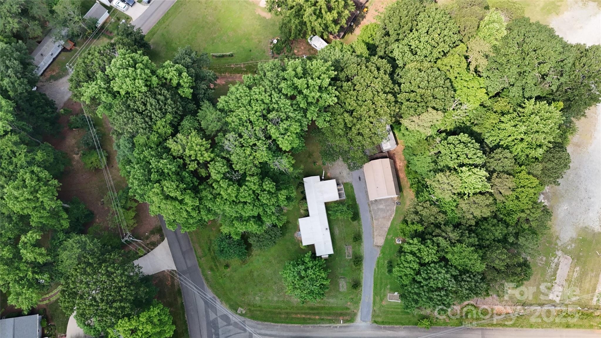 8112 Blackwood Road Denver, NC 28037 - Photo 6 of 19 an aerial view of a house with a yard and trees