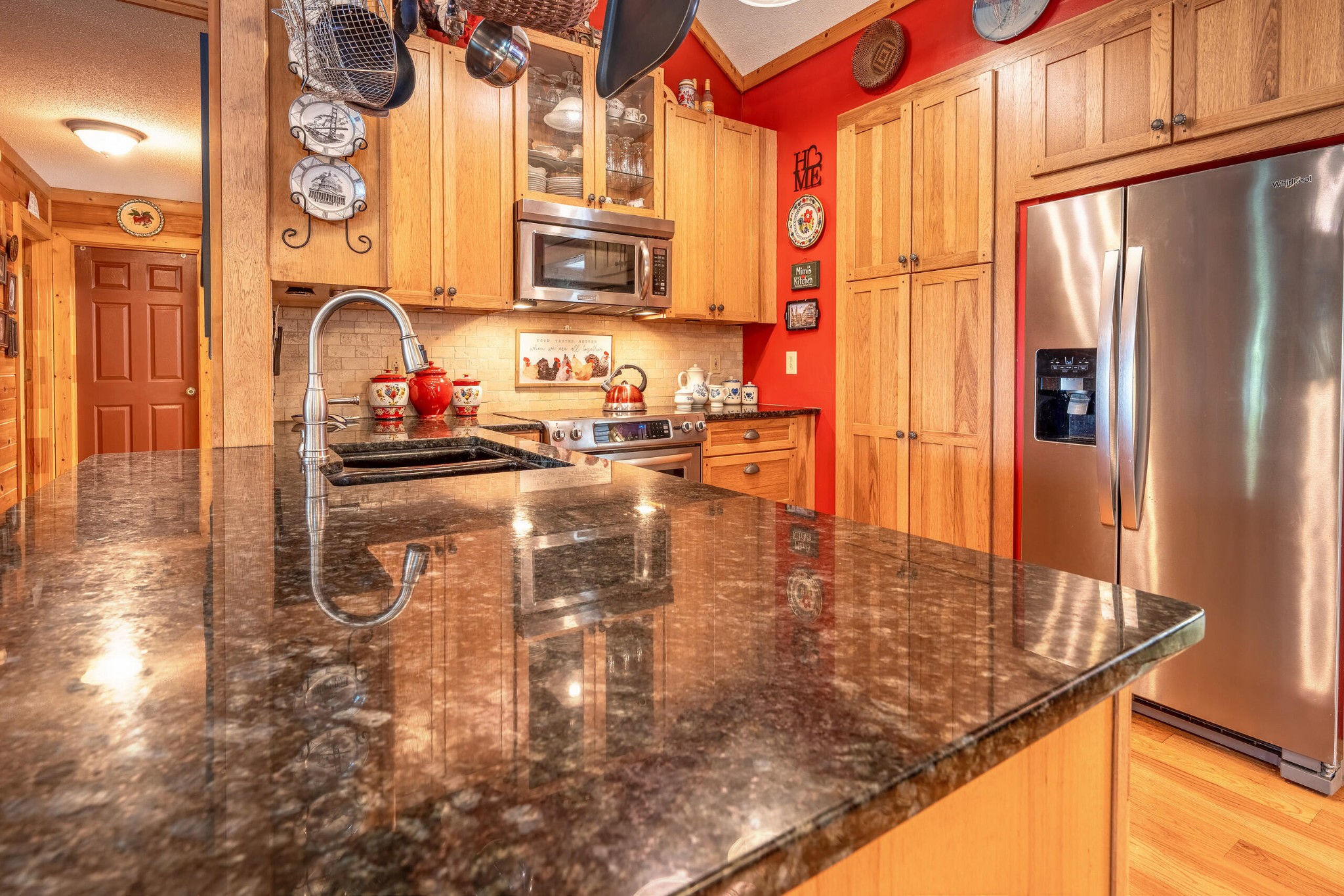 260 Deer Ridge Trail Ocoee, TN 37361 - Photo 43 of 72 a kitchen with sink refrigerator and microwave