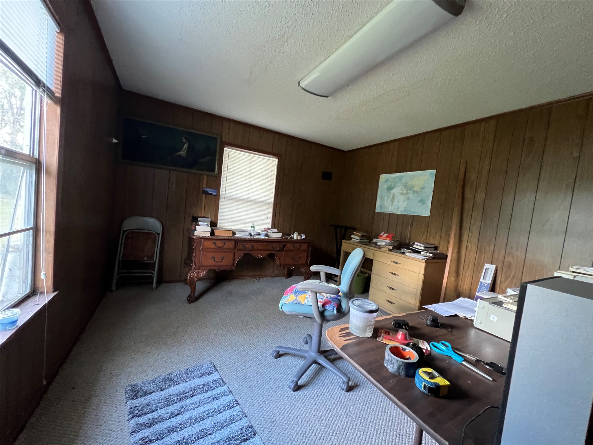 Tbd Filmore Street Trinity, TX 75862 - Photo 16 of 26 a view of a workspace with furniture and a window