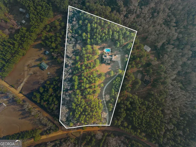 a view of staircase with railing and a trees