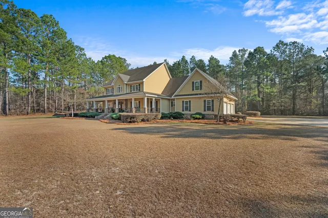 a house with trees in front of it