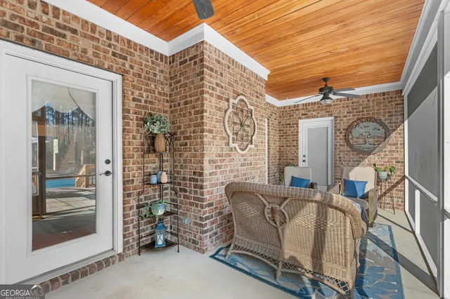 a view of road with large trees