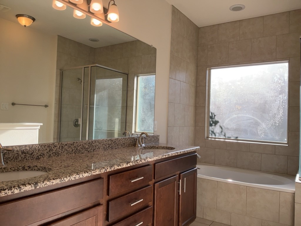 2909 Tempe Drive Leander, TX 78641 - Photo 22 of 38 Primary bathroom with dual sinks