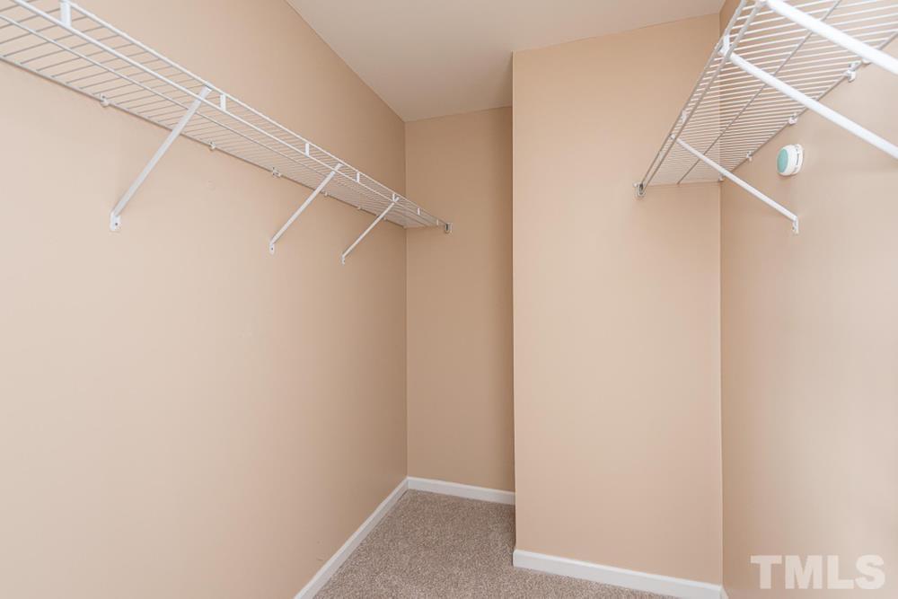 3519 Oneonta Avenue Raleigh, NC 27604 - Photo 19 of 30 Walk-in closet in Primary Bedroom with wire shelving.