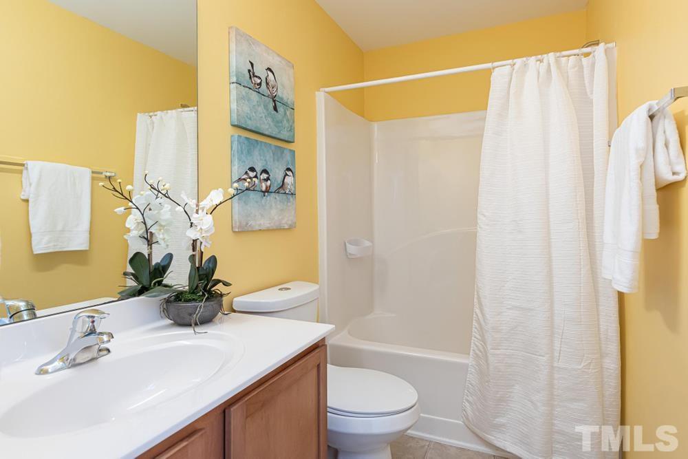 3519 Oneonta Avenue Raleigh, NC 27604 - Photo 24 of 30 Full bath on upper level with tub/shower.