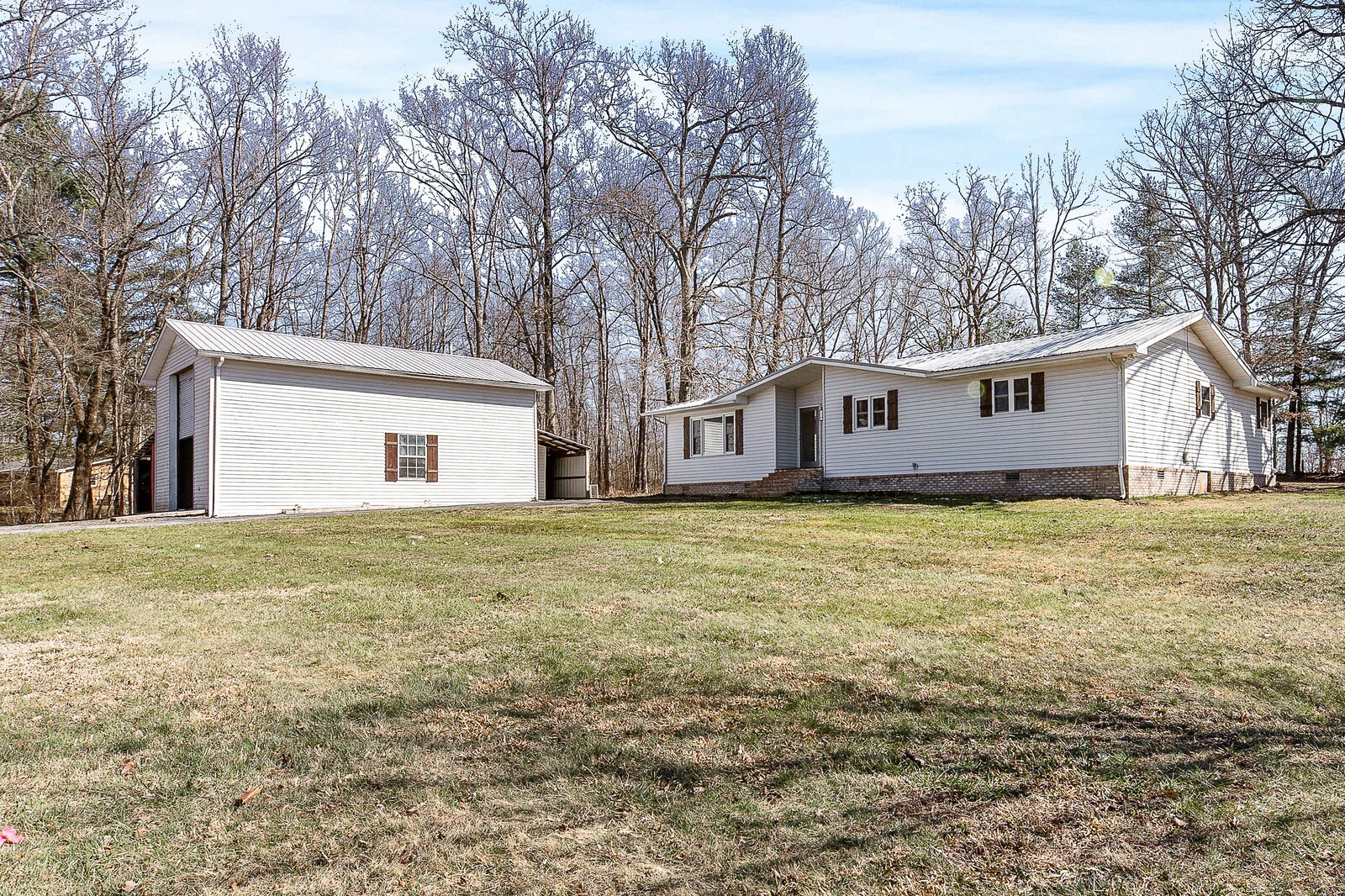 118 Rollins Road Sparta, TN 38583 - Photo 1 of 33 a house view with a backyard space