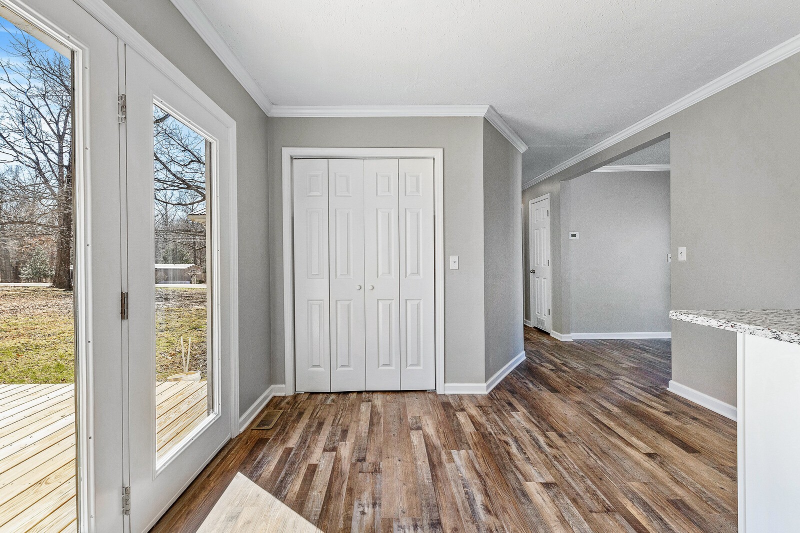 118 Rollins Road Sparta, TN 38583 - Photo 15 of 33 a view of a room with wooden floor and windows
