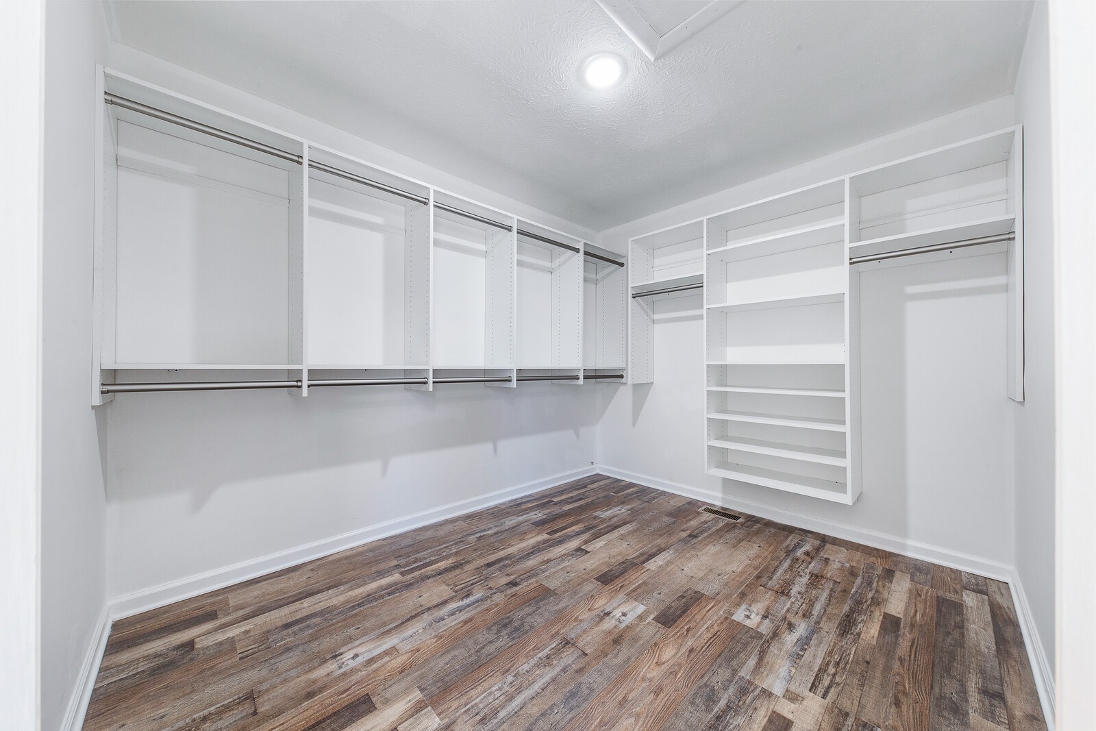 118 Rollins Road Sparta, TN 38583 - Photo 28 of 33 a view of walk in closet with empty racks