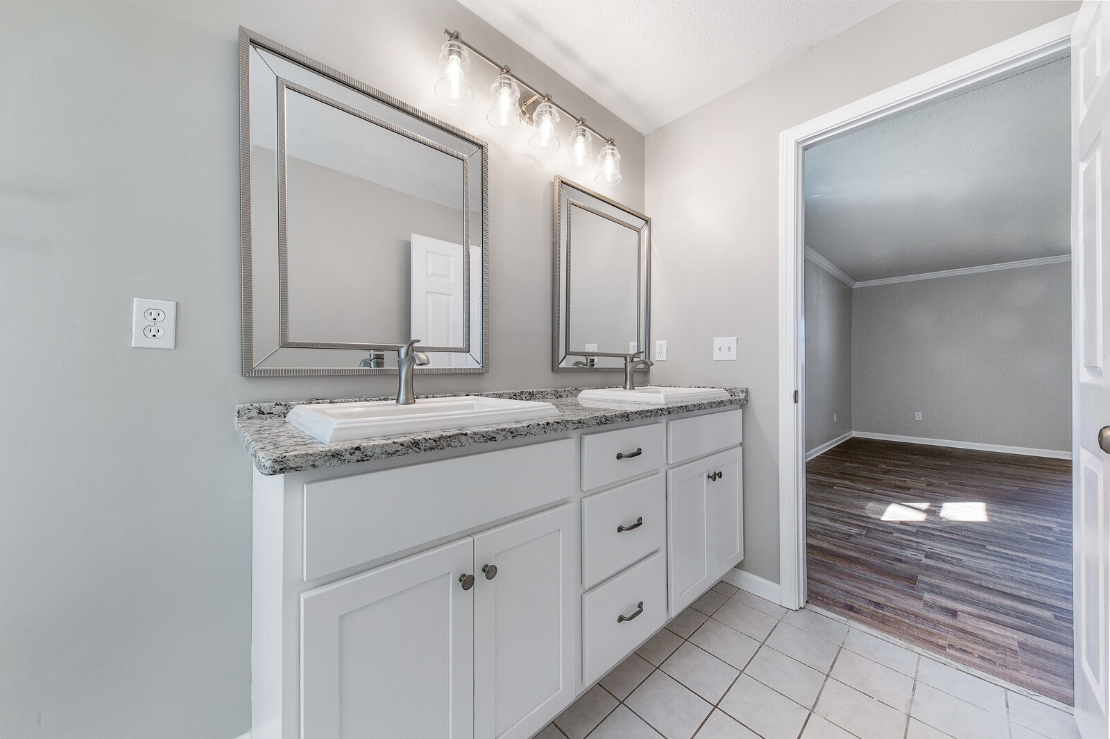 118 Rollins Road Sparta, TN 38583 - Photo 29 of 33 a bathroom with a granite countertop sink and a mirror