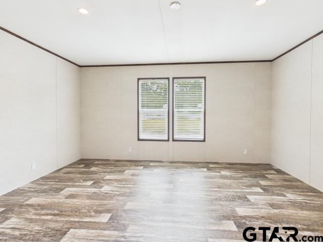 7191 Stella Street Murchison, TX 75778 - Photo 12 of 32 an empty room with windows