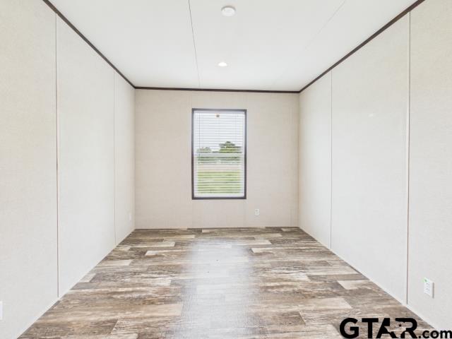 7191 Stella Street Murchison, TX 75778 - Photo 21 of 32 a view of an empty room with a window