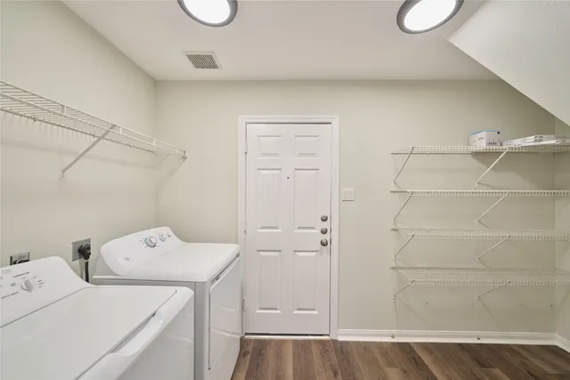 a utility room with dryer and washer
