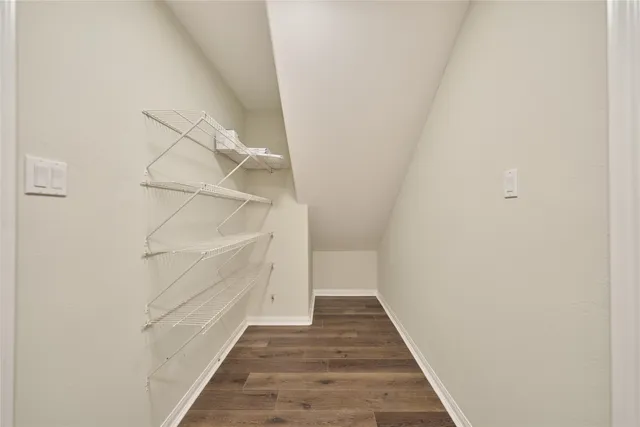a view of a hallway with stairs