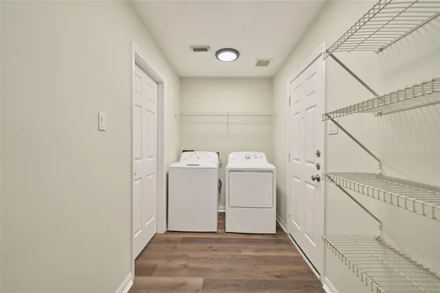 a utility room with dryer and washer
