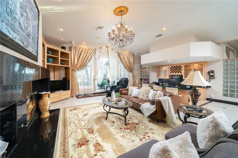 a kitchen with a sink refrigerator and cabinets