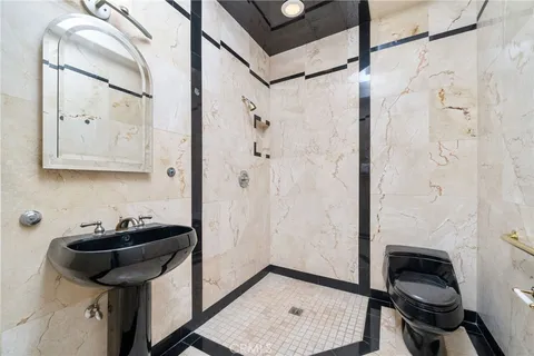 a swimming pool with outdoor seating and yard