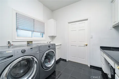 a swimming pool with outdoor seating and yard