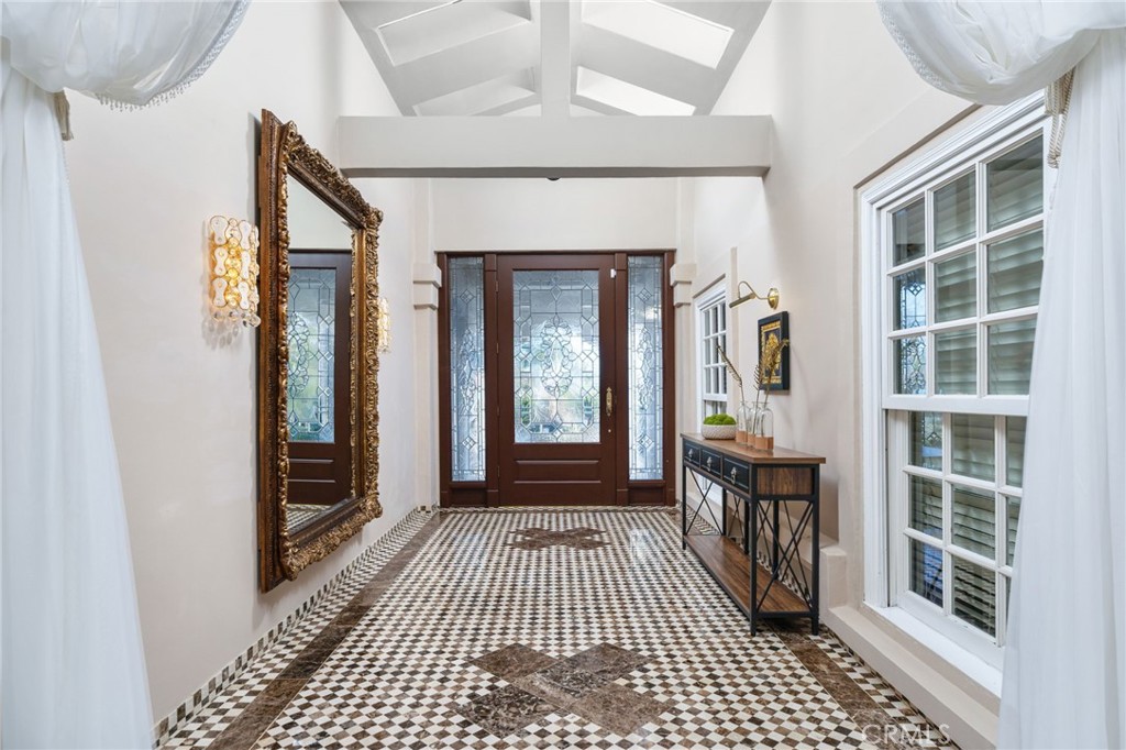 275 East 24th Street Upland, CA 91784 - Photo 6 of 74 a view of a porch with wooden floor and windows