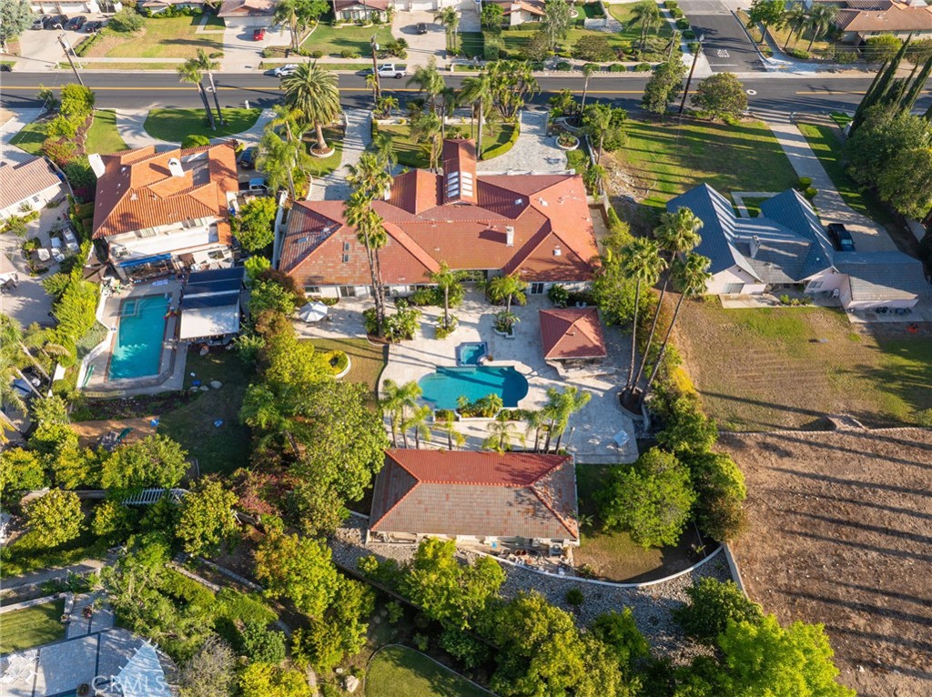 275 East 24th Street Upland, CA 91784 - Photo 67 of 74 an aerial view of residential house with outdoor space and swimming pool