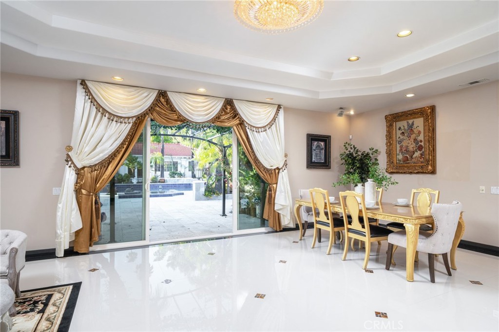 275 East 24th Street Upland, CA 91784 - Photo 9 of 74 a dining room with furniture and a large window