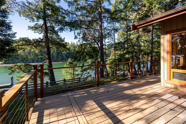 a view of a balcony with chairs