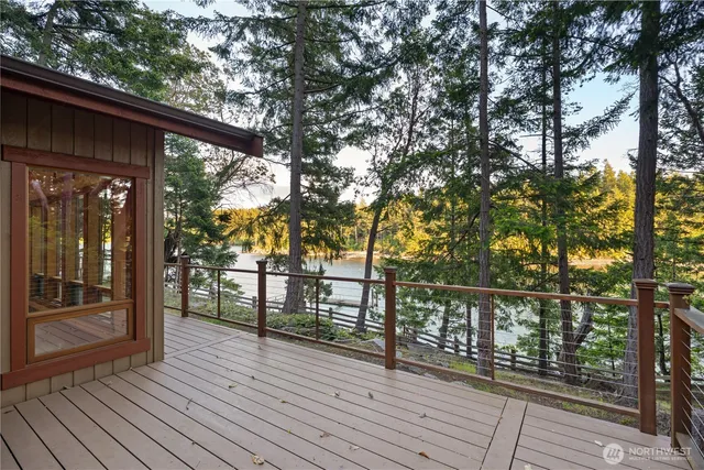 a view of outdoor space with deck and yard