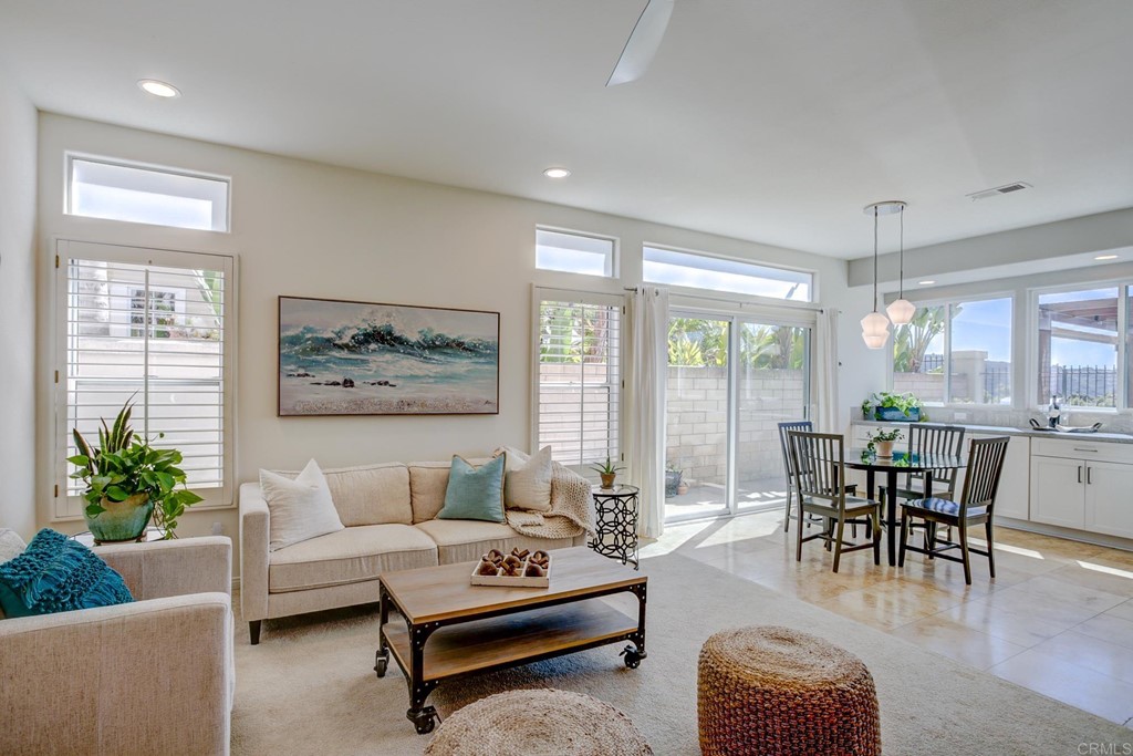 1732 Blackbird Circle Carlsbad, CA 92011 - Photo 13 of 39 a living room with furniture and a large window