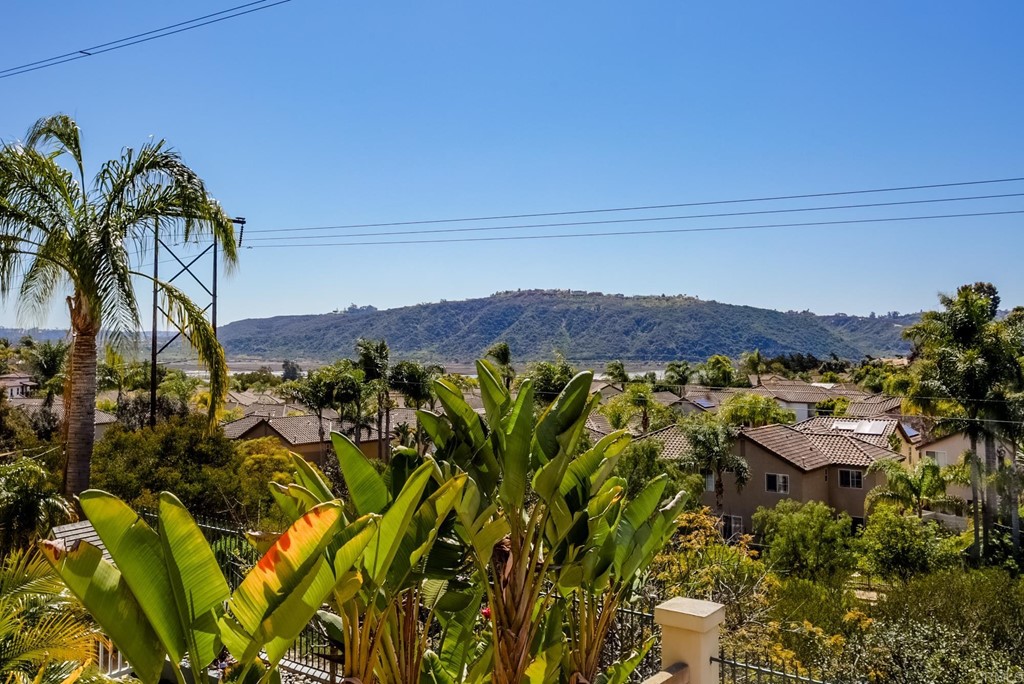 1732 Blackbird Circle Carlsbad, CA 92011 - Photo 2 of 39 a view of a bunch of trees and houses