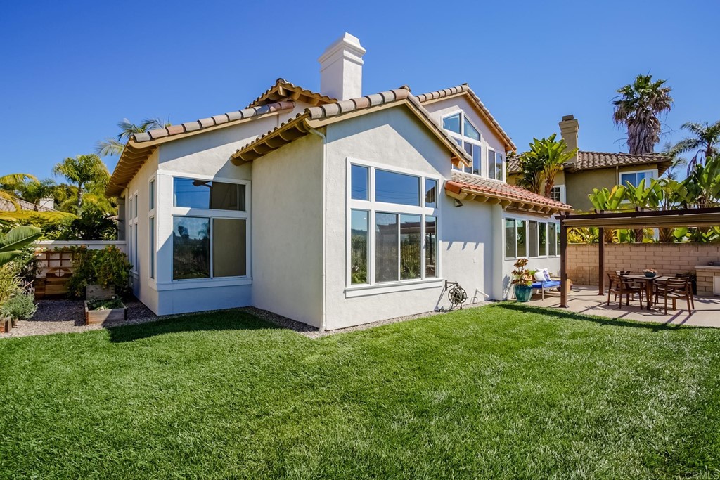 1732 Blackbird Circle Carlsbad, CA 92011 - Photo 21 of 39 a view of a house with a yard