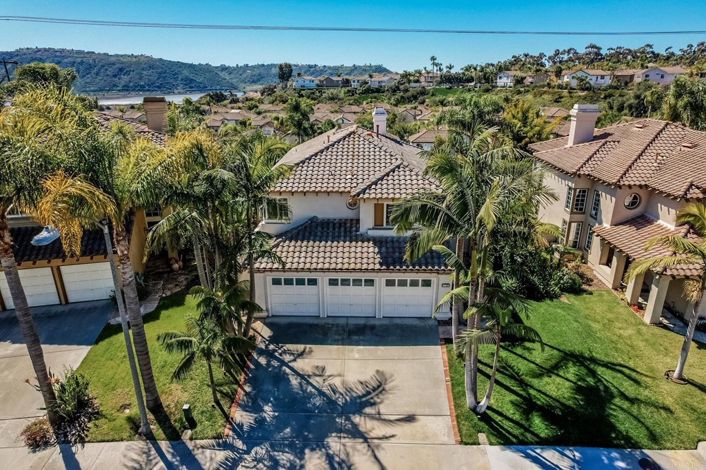 1732 Blackbird Circle Carlsbad, CA 92011 - Photo 35 of 39 an aerial view of a house with a garden