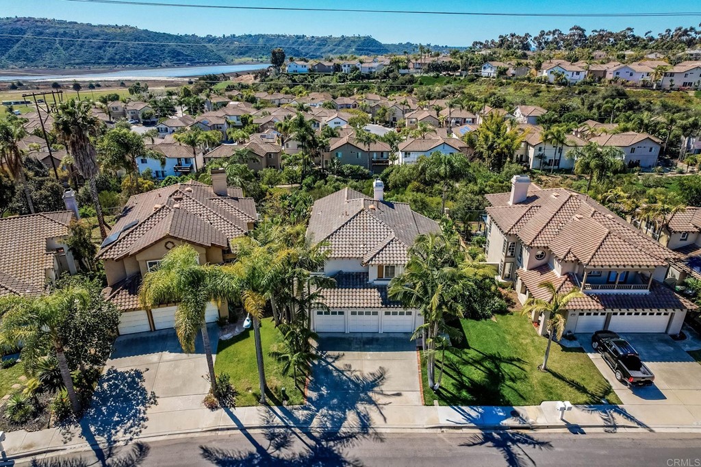 1732 Blackbird Circle Carlsbad, CA 92011 - Photo 37 of 39 an aerial view of multiple houses with a yard