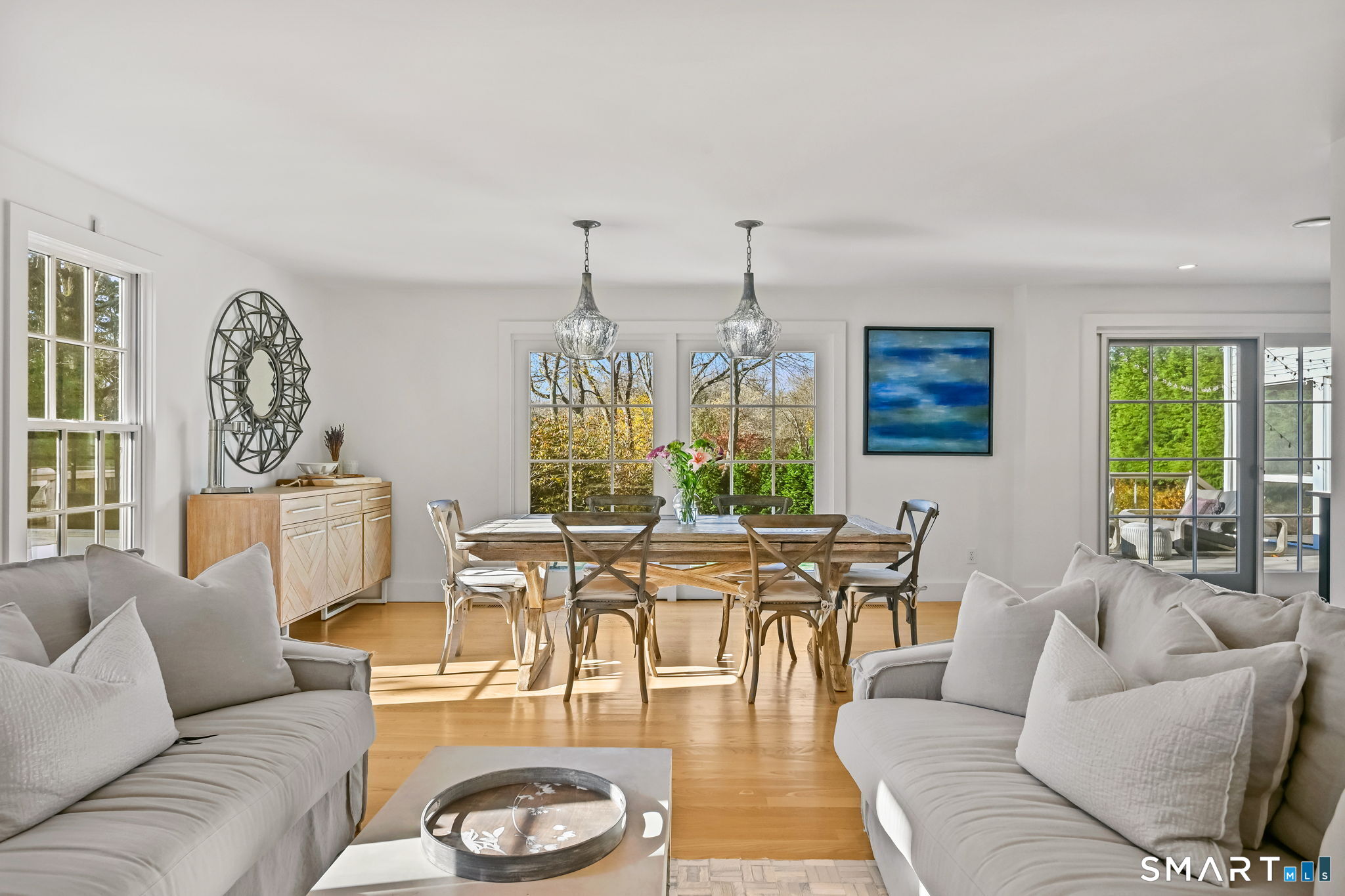 150 Hillspoint Road Westport, CT 06880 - Photo 14 of 40 a living room with furniture and a large window