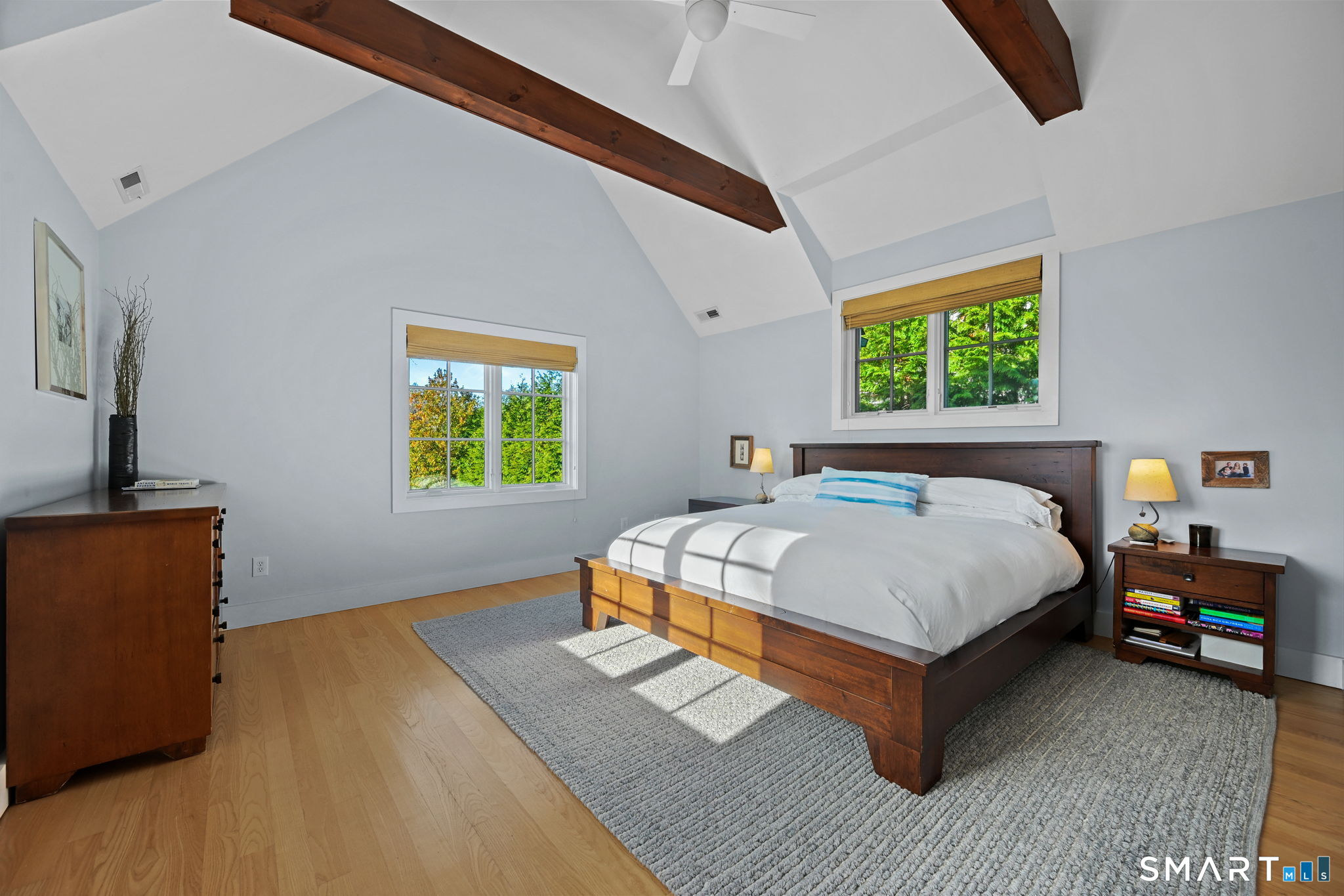 150 Hillspoint Road Westport, CT 06880 - Photo 19 of 40 a bedroom with a bed and a window