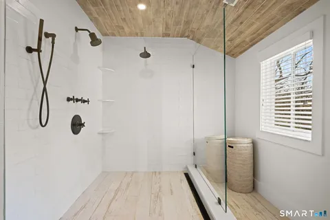 a room with a bed and a window