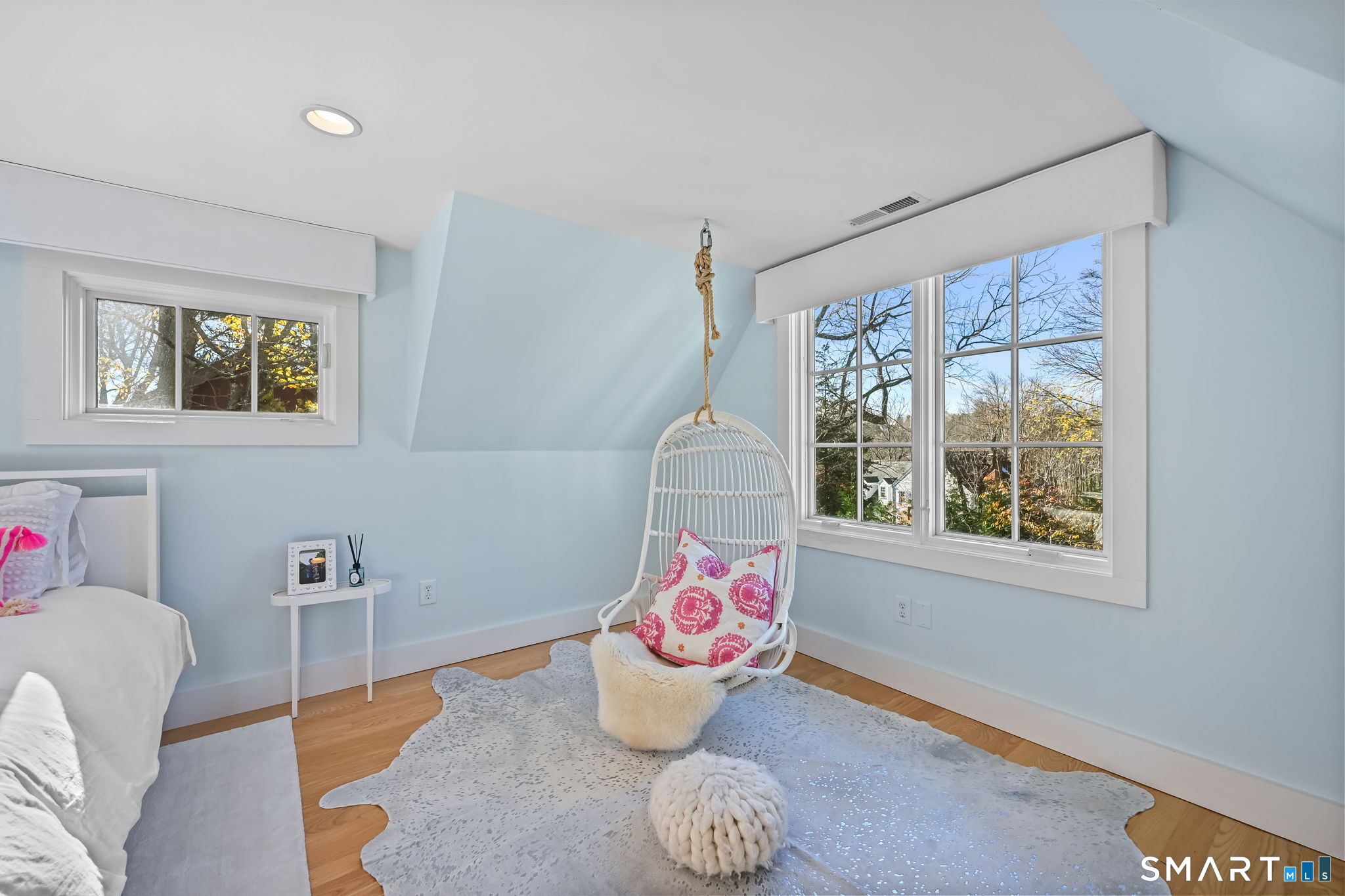150 Hillspoint Road Westport, CT 06880 - Photo 25 of 40 a living room with furniture and a window
