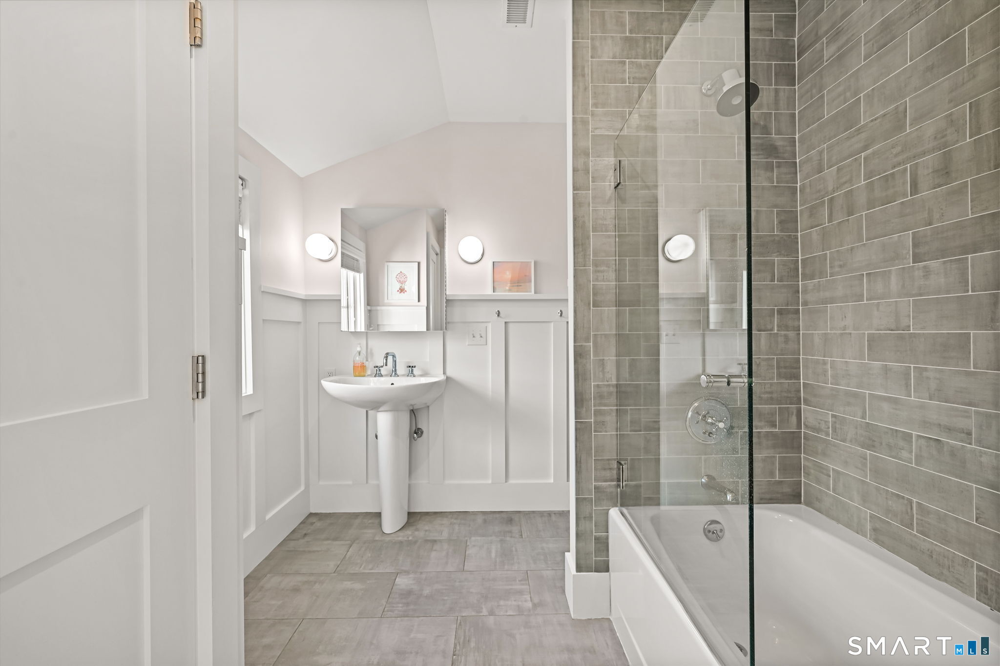 150 Hillspoint Road Westport, CT 06880 - Photo 26 of 40 a bathroom with a shower and a sink