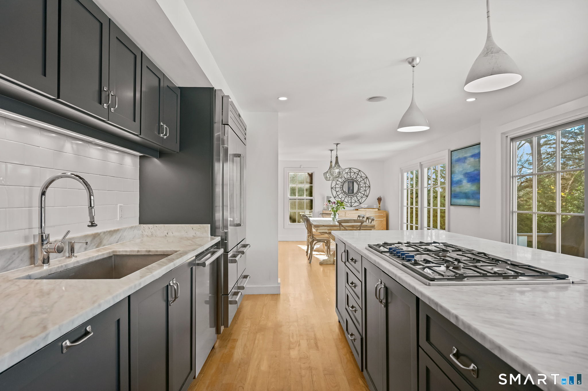 150 Hillspoint Road Westport, CT 06880 - Photo 3 of 40 a kitchen with a sink stove and refrigerator