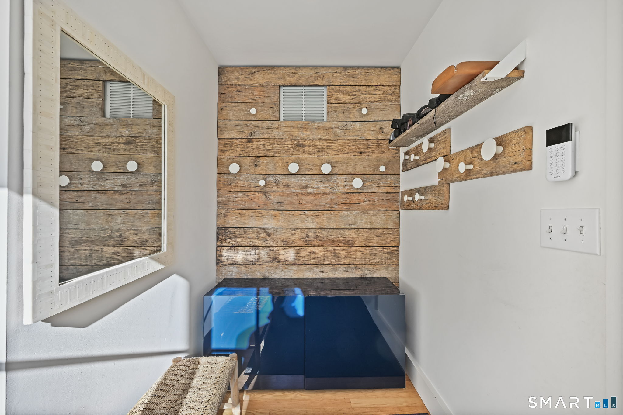 150 Hillspoint Road Westport, CT 06880 - Photo 10 of 40 a view of entry way with wooden floor