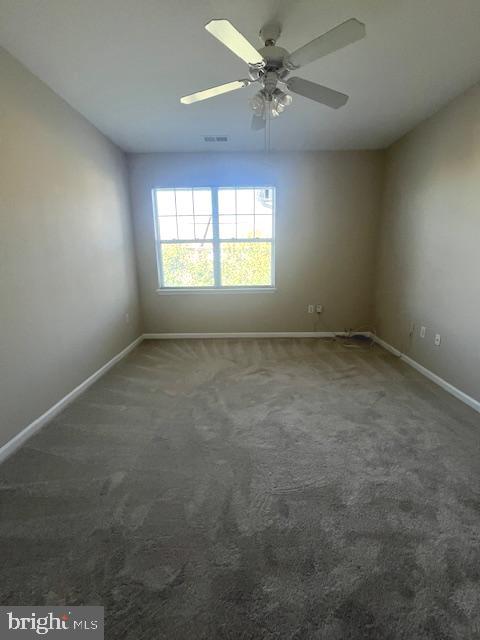 13501 Kildare Hills Terrace, Unit 402 Germantown, MD 20874 - Photo 11 of 14 an empty room with a window
