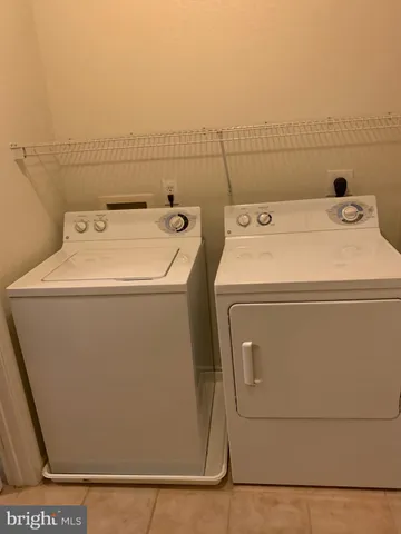 a view of backyard with a deck