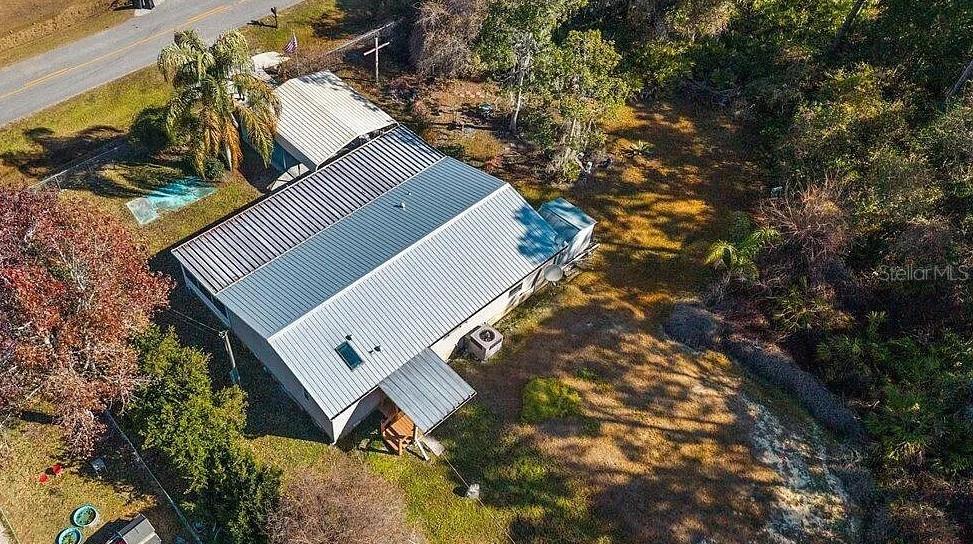251 Paradise Shores Road Crescent City, FL 32112 - Photo 1 of 1 a view of a house with a yard