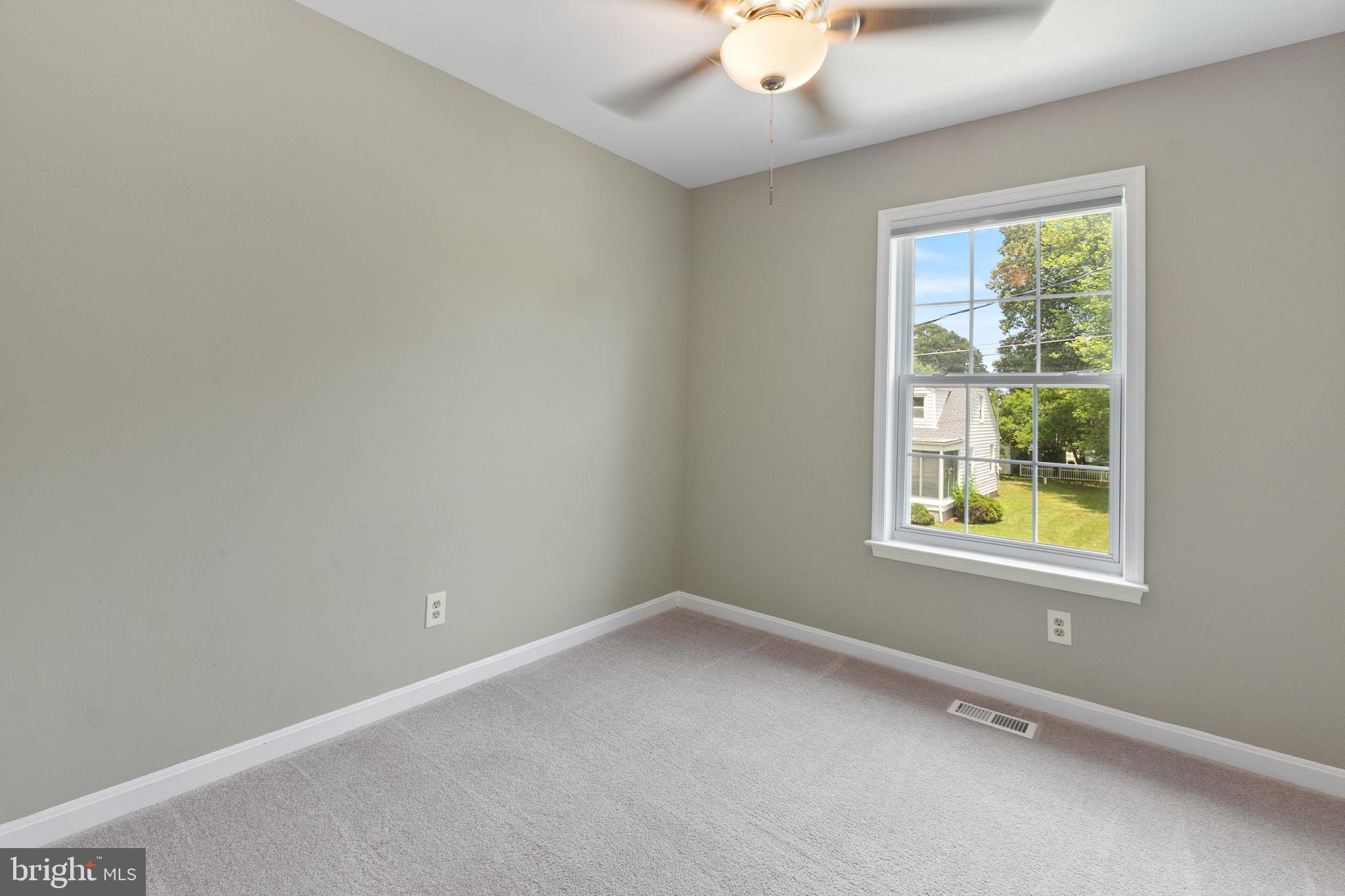 1527 Lincoln Road Shady Side, MD 20764 - Photo 11 of 30 an empty room with a window