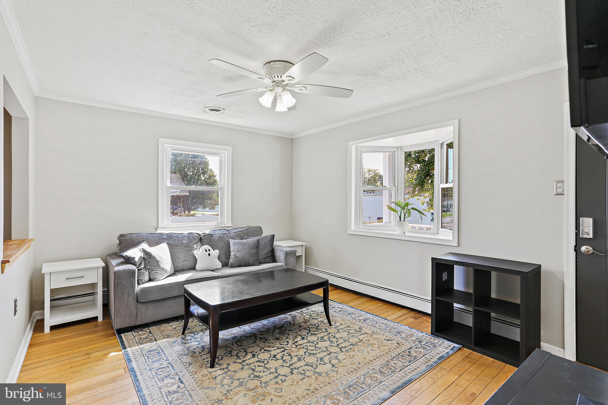 Bright Living Room w/Hardwood Flooring