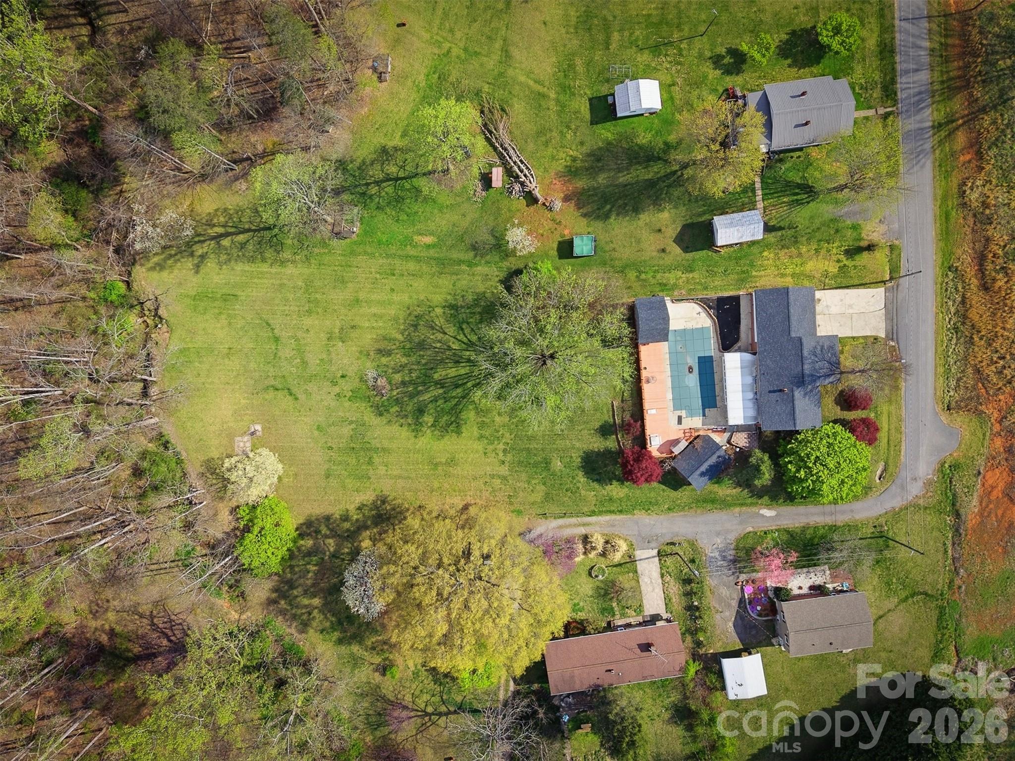 2174 Chester Avenue Morganton, NC 28655 - Photo 17 of 38 an aerial view of residential houses with outdoor space