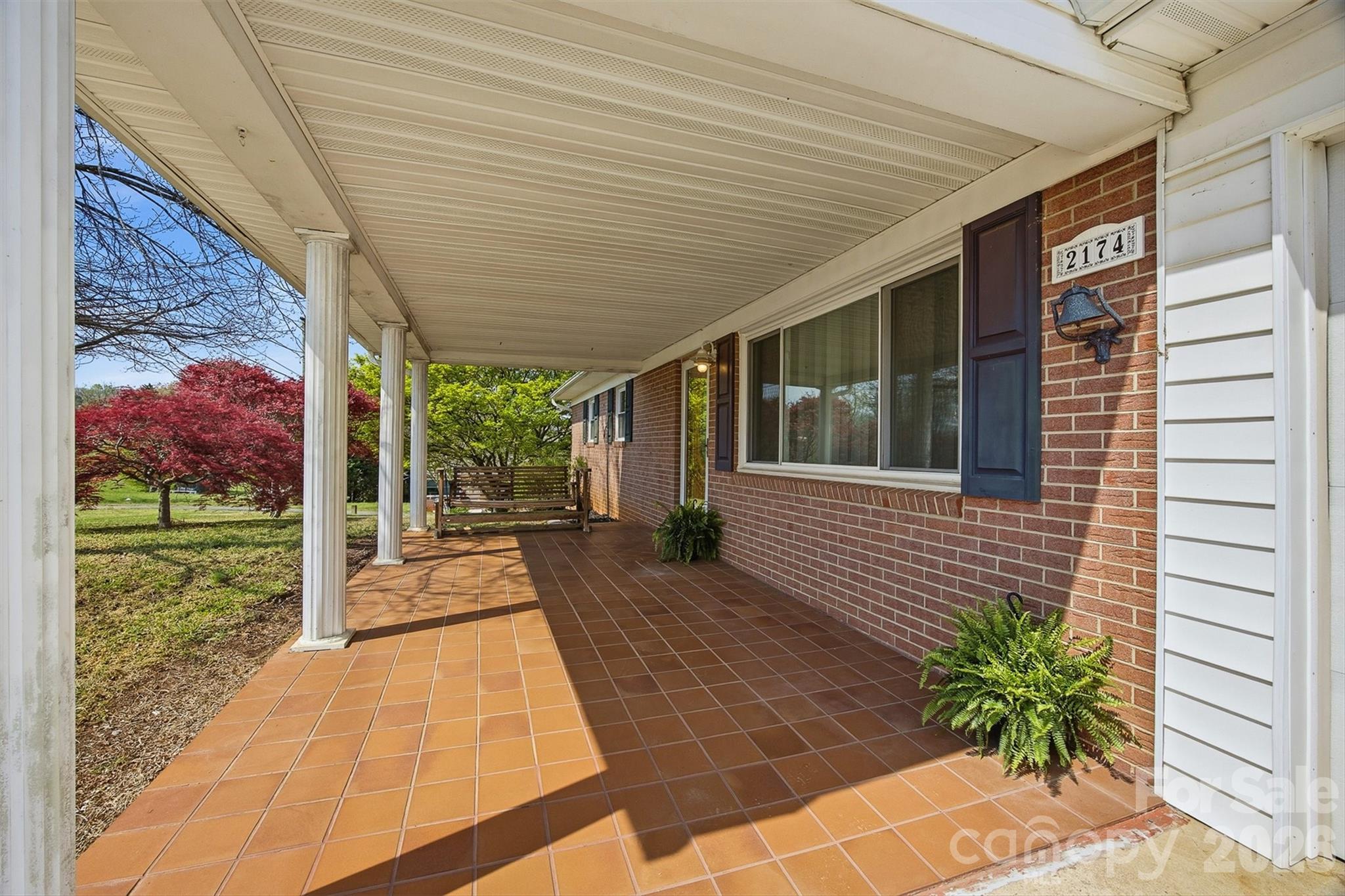 2174 Chester Avenue Morganton, NC 28655 - Photo 19 of 38 a porch with seating space