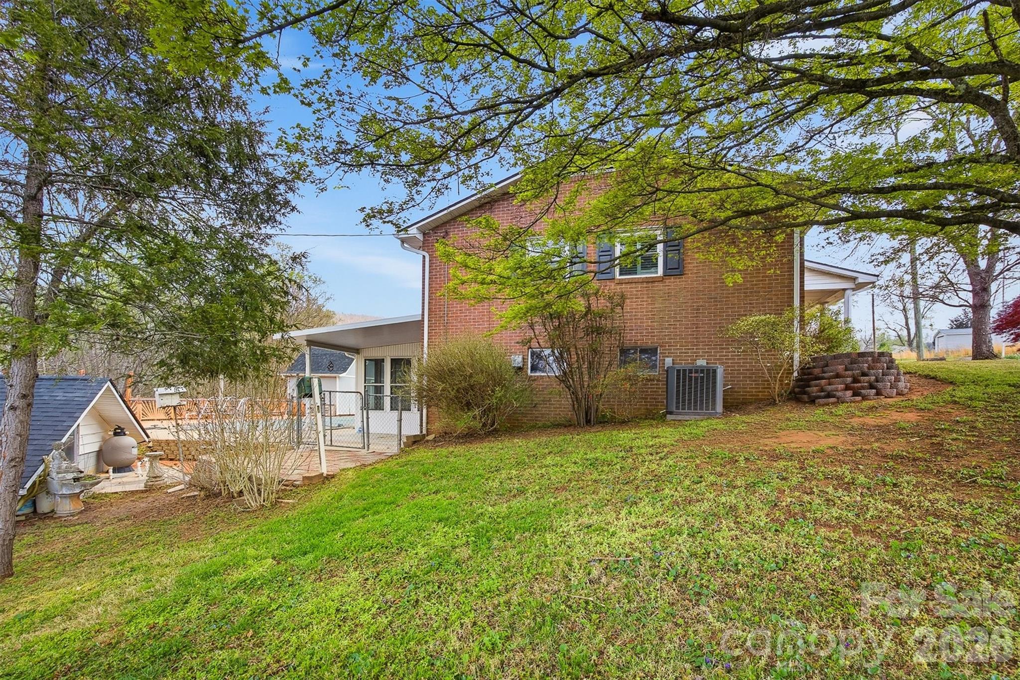2174 Chester Avenue Morganton, NC 28655 - Photo 7 of 38 a view of a house with a yard